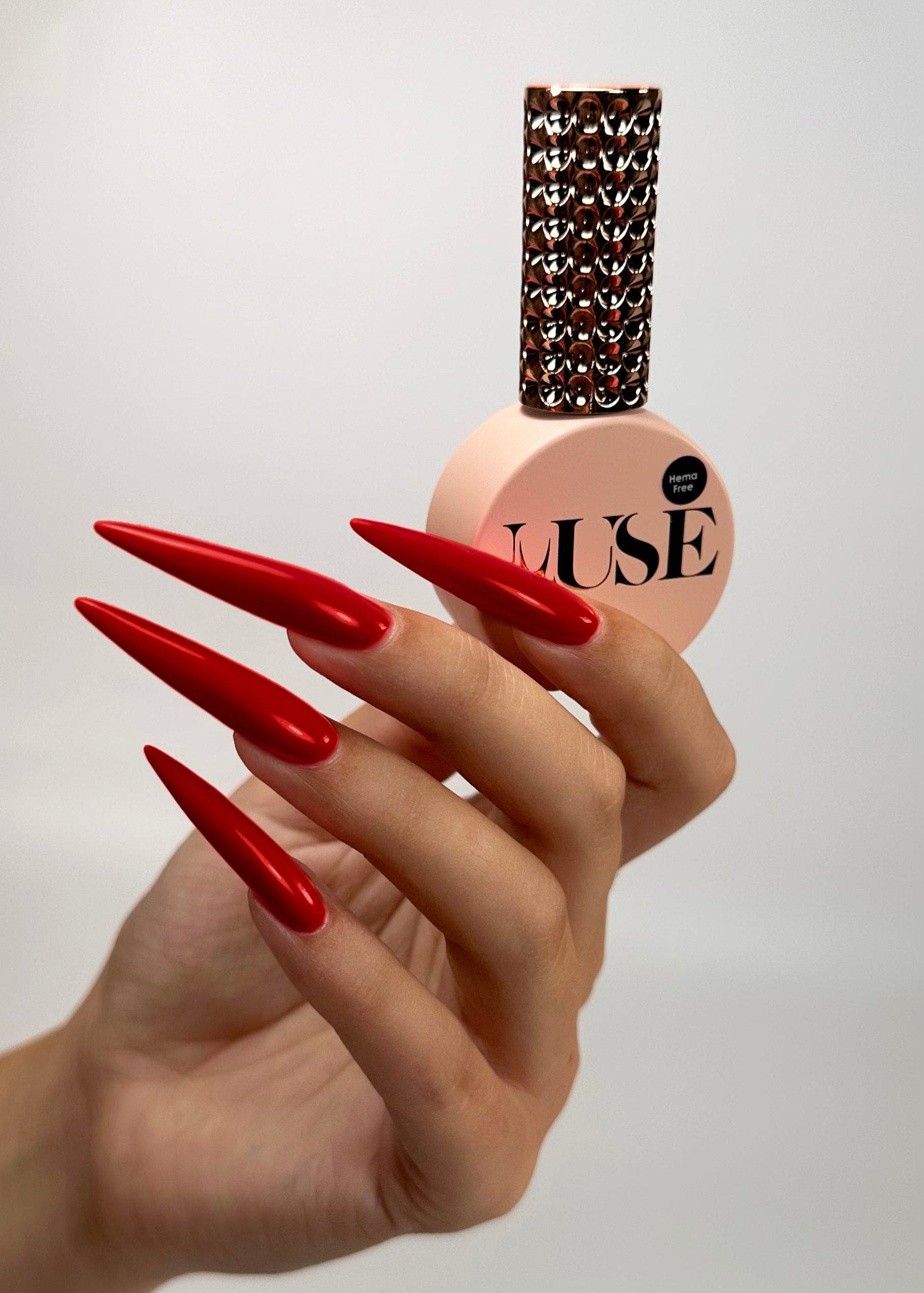 "Wine red gel polish manicure with a rich, luxurious finish."