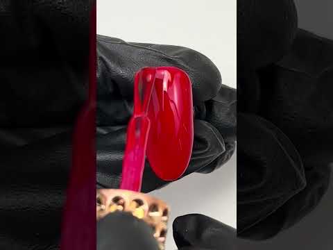 Applying MuseGel Creator #1 Red Base Gel for smooth, vibrant red nail coverage