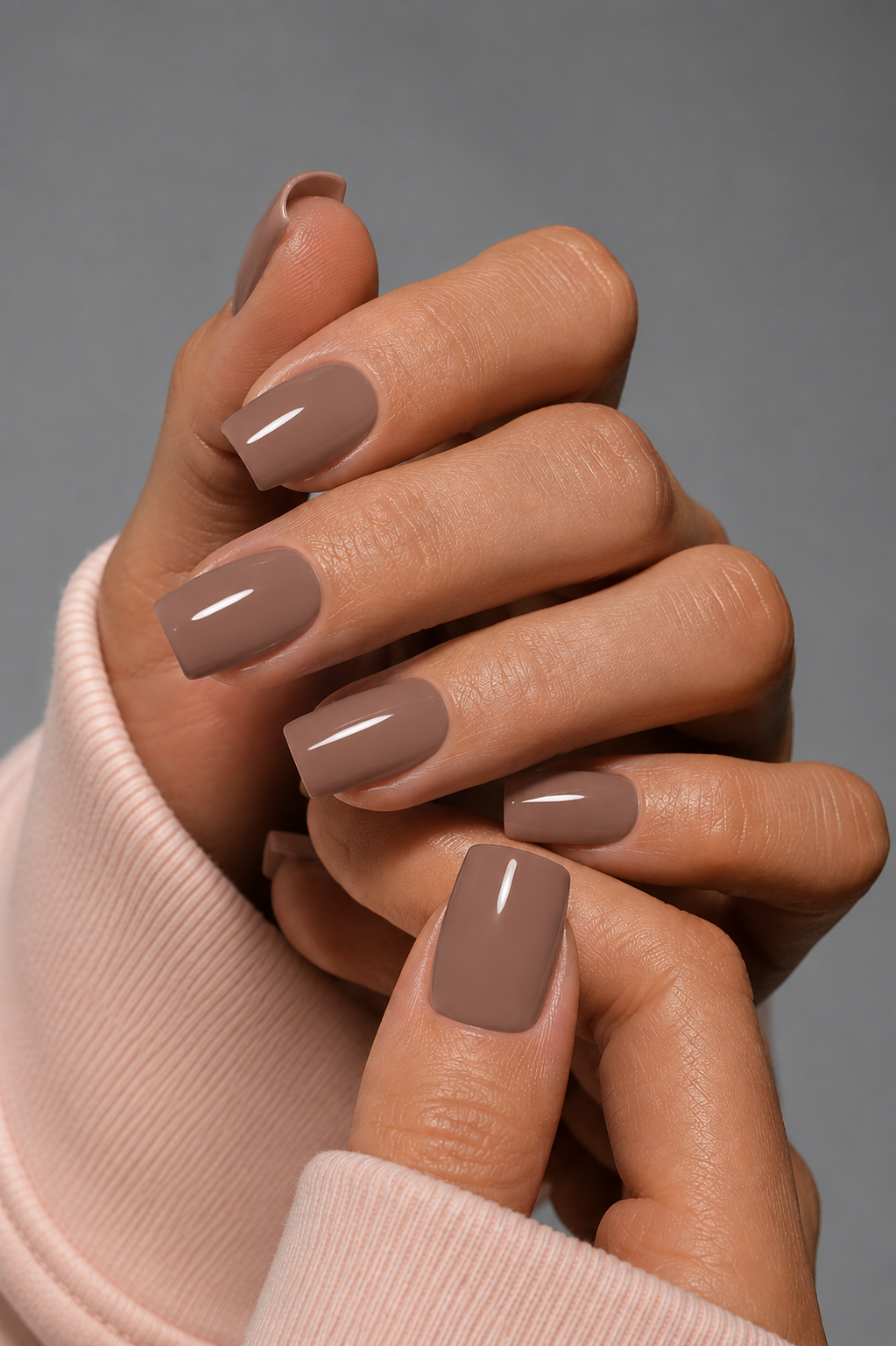 Muse Warm Mocha Builder Gel shown on glossy square nails in a soft warm mocha nude shade with creamy mauve undertones