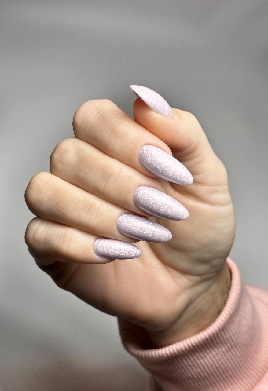 Soft lilac nails with a luxurious satin finish, created with Muse Satin Lilac Whisper Gel Polish.