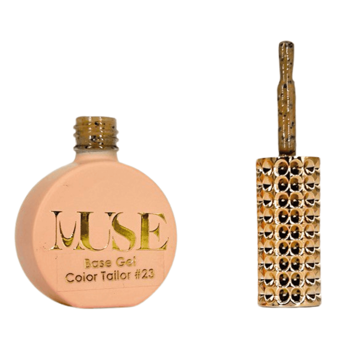 "A bottle of MUSE Base Gel in a light peach shade labeled Color Tailor #23 with the cap off, featuring a brush with a gold glittery handle and a gold-studded brush head."