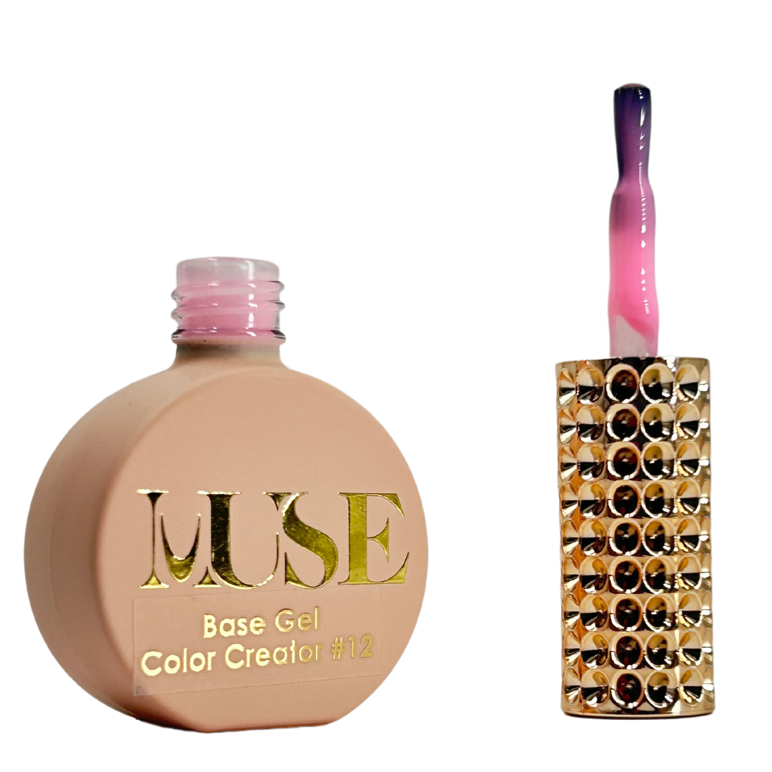 A bottle of MUSE Base Gel Color Creator #12 with a light pink cap and a crystal-studded brush handle, suggesting a gentle baby pink gel polish inside.