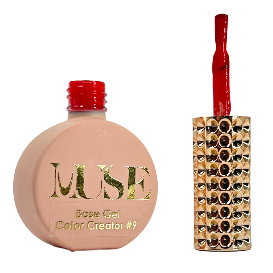 A bottle of MUSE Base Gel Color Creator #9 with a bright red-orange cap and a crystal-studded brush handle, indicative of the warm red gel polish color within.