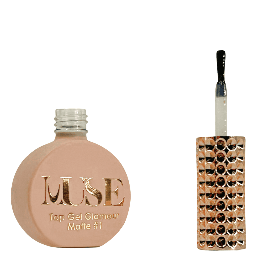 A bottle of MUSE Top Gel Glamour in Matte #1, showcasing a flat, circular base with a matte peach exterior. The cap features a silver glitter finish, and the brush applicator is designed with a clear handle containing glitter. The bottle's label is inscribed with the MUSE logo in gold, with the product name "Top Gel Glamour Matte #1" clearly displayed below.