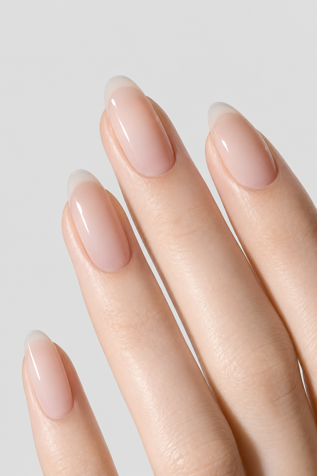 Natural nude almond-shaped manicure created using Muse Anti Lifting Base, showing smooth application, strong adhesion, long-lasting wear, and a flawless natural nail finish.
