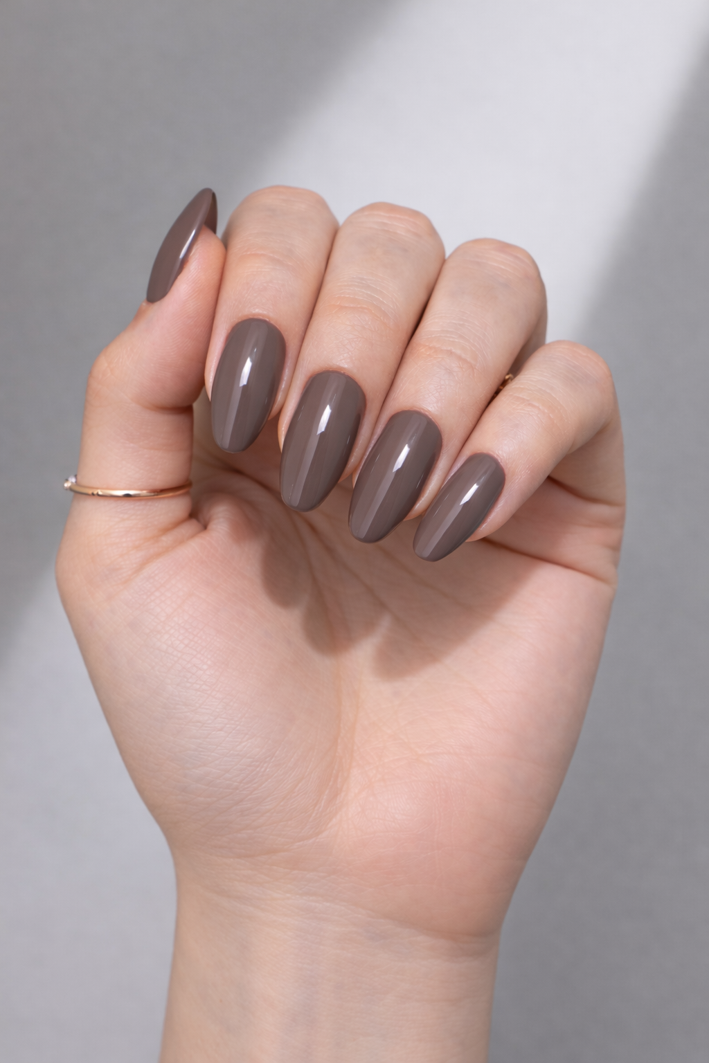 Deep taupe brown gel polish on almond nails – HEMA & TPO Free