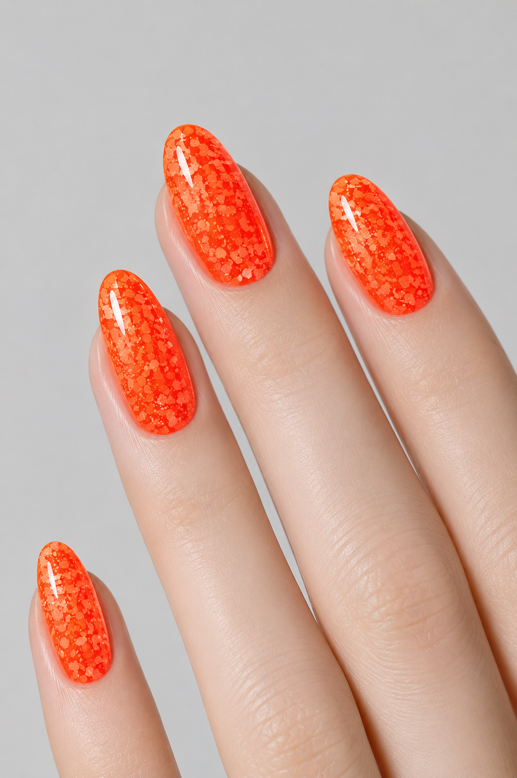 Muse Gel Creator Base #25 Neon Orange Glitter builder base gel on almond-shaped nails featuring vibrant fluorescent orange shimmer and reflective glitter finish, professional soak-off base gel for summer nail designs in Canada