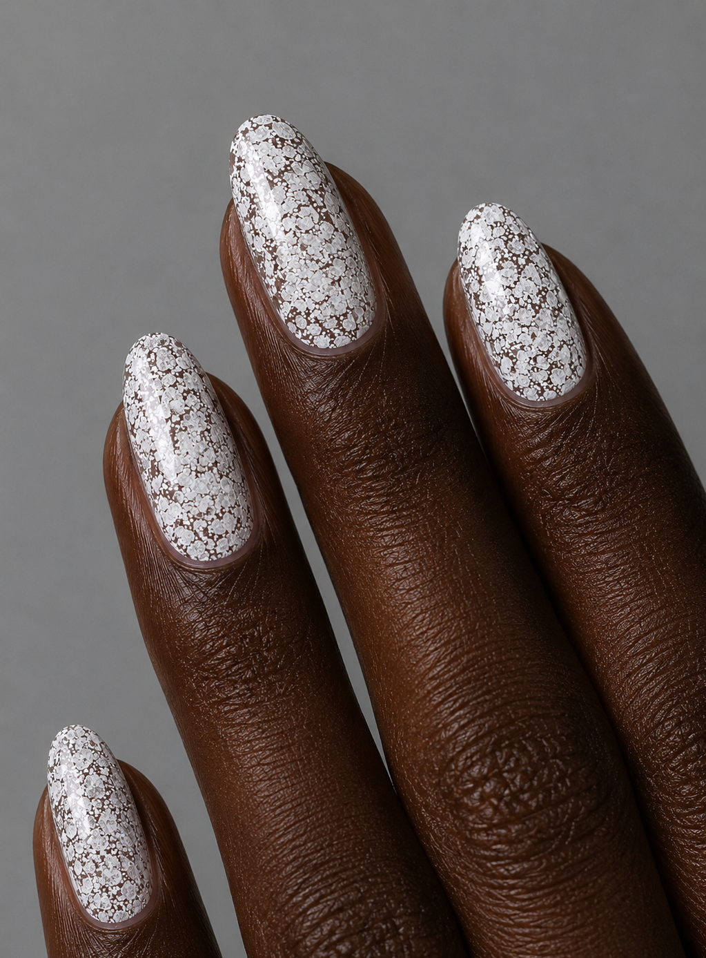 Muse Gel Creator Base #30 white glitter color base gel on almond-shaped nails featuring soft milky white sparkle and reflective glitter finish, professional soak-off color base gel for elegant bridal and winter nail designs in Canada
