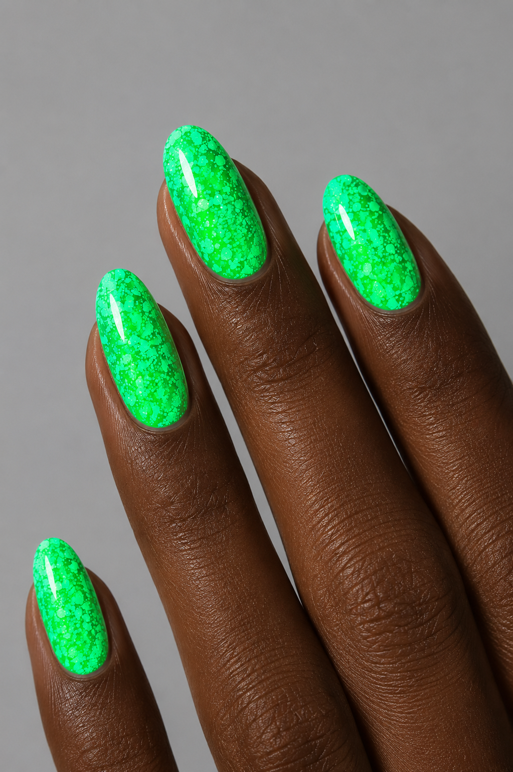 Muse Gel Creator Base #31 neon green glitter color base gel on almond-shaped nails featuring vibrant fluorescent green sparkle and reflective glitter finish, professional soak-off color base gel for bold summer nail designs in Canada