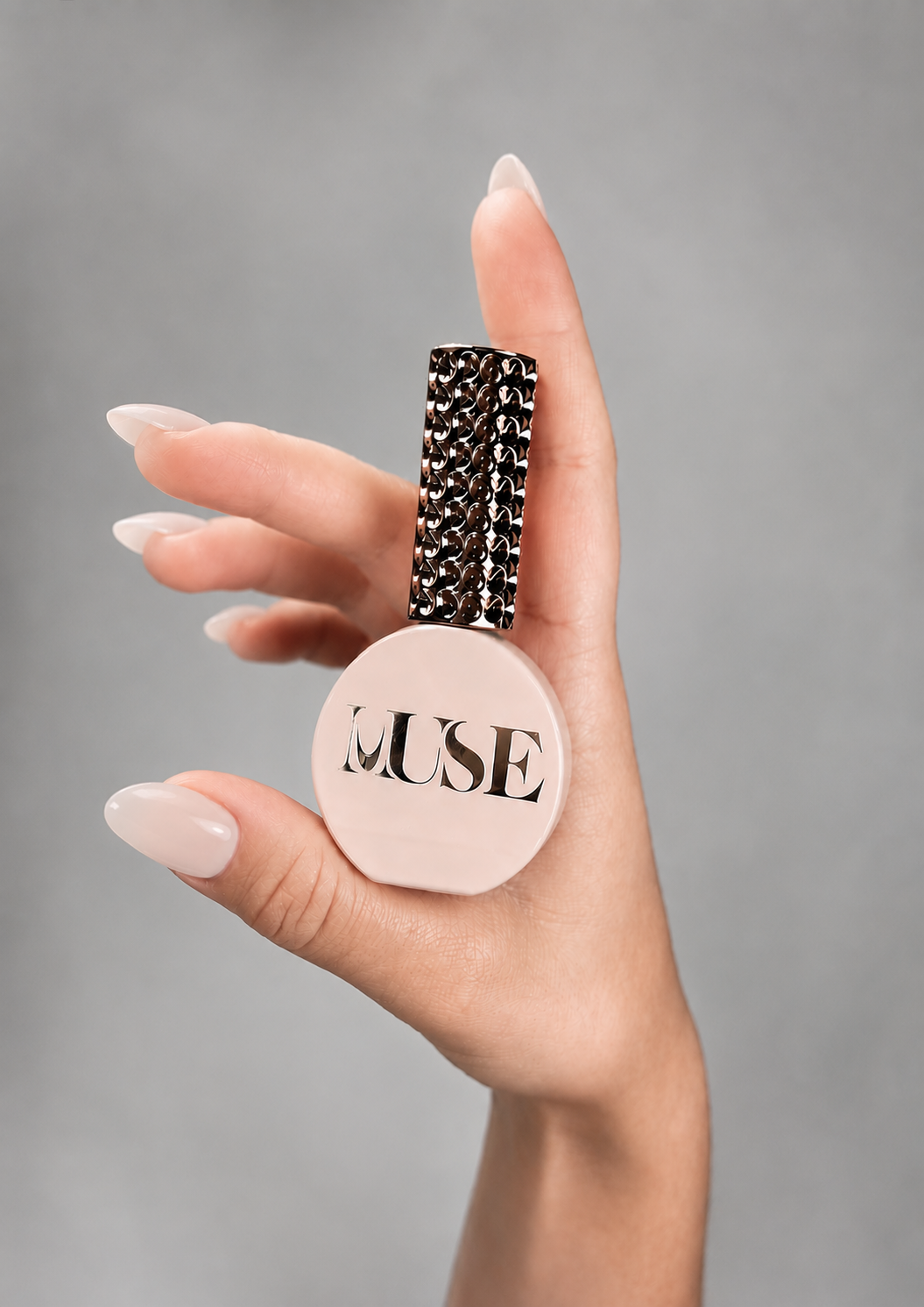 Muse Gel Creator Base #33 milky pink nude color base gel on elegant almond nails with a glossy semi-transparent finish, professional soak-off UV/LED gel for natural nails and overlay