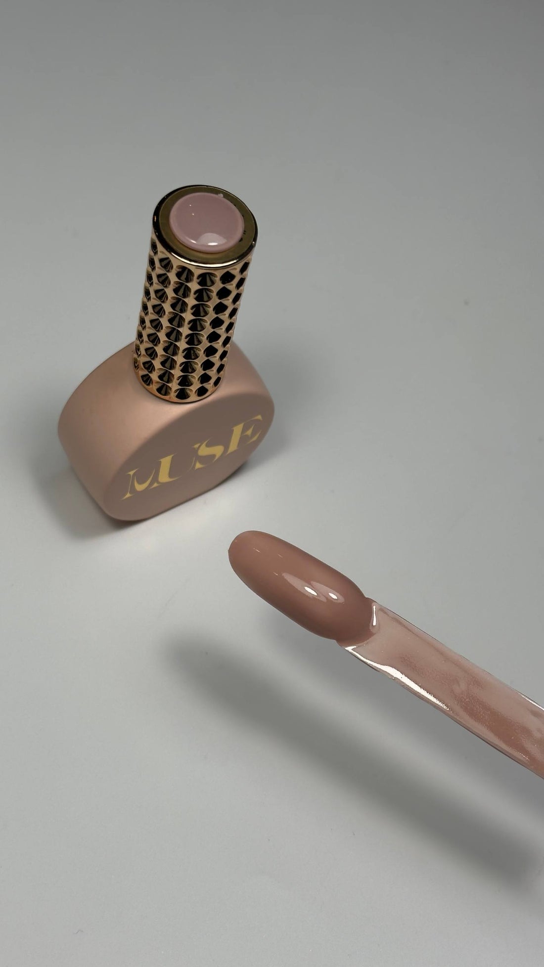 Rich caramel nude gel polish with soft shimmer finish