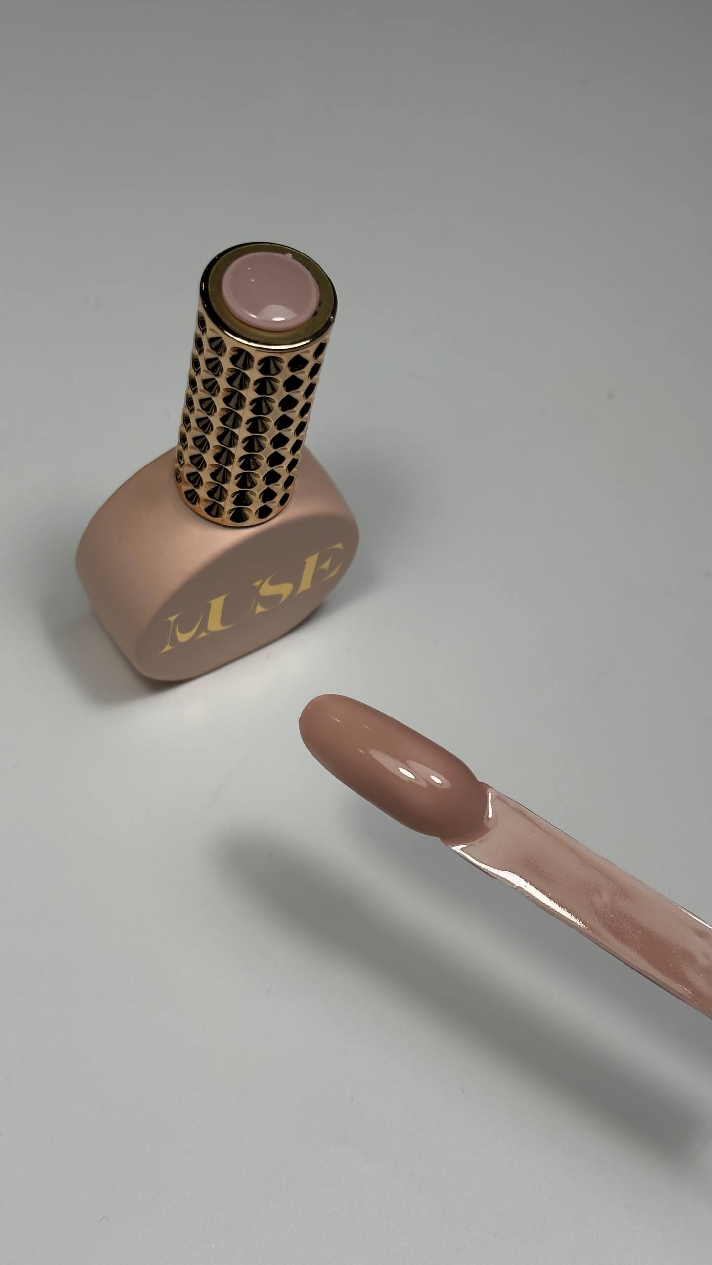 Rich caramel nude gel polish with soft shimmer finish