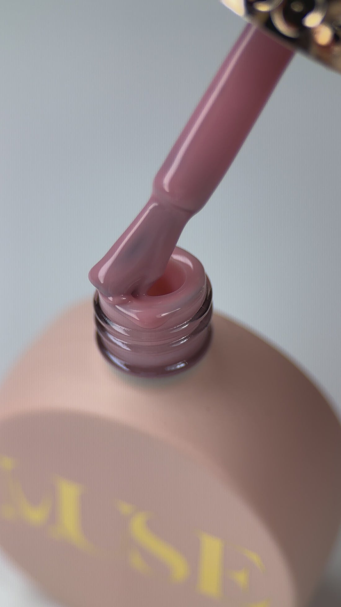 Long-lasting, self-leveling base gel #44 Natural Nude Brown for durable professional manicures.