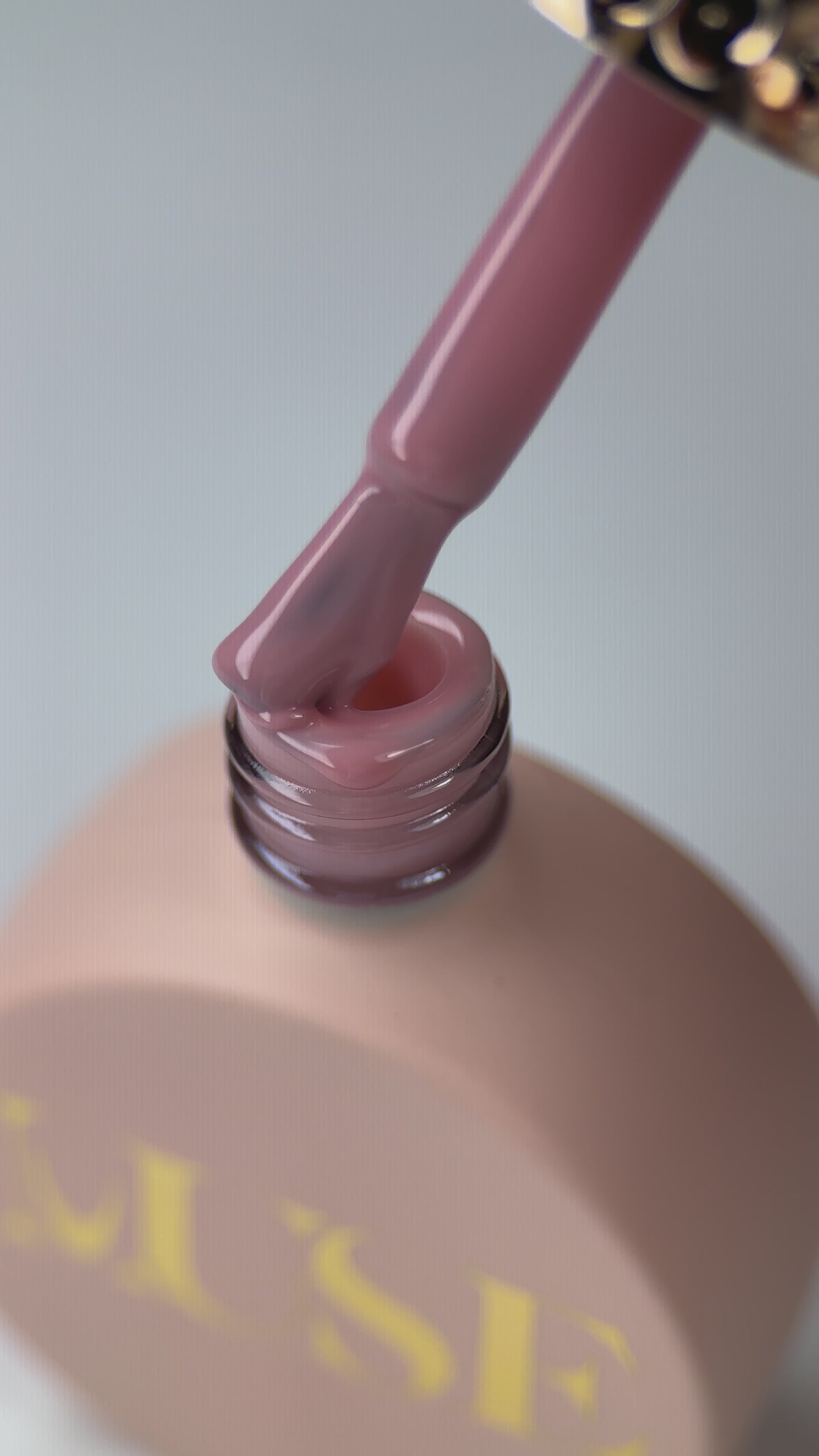 Long-lasting, self-leveling base gel #44 Natural Nude Brown for durable professional manicures.