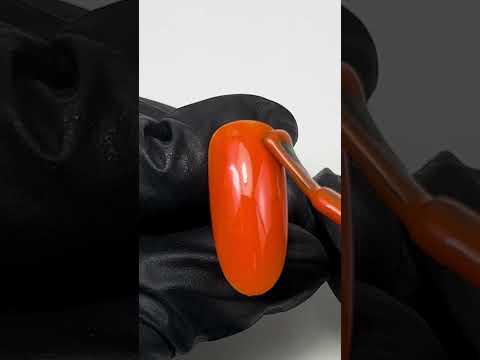 Swatch of Sunset Orange Nail Base Gel showcasing its vibrant, glowing orange hue.