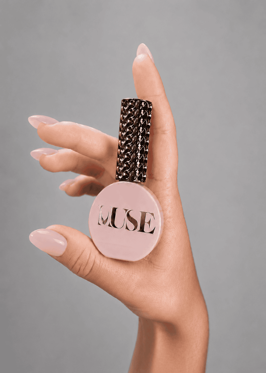 Muse Gel Creator Base #19 Light Nude Pink color base gel on elegant almond-shaped nails. Semi-transparent nude pink gel polish with a natural milky finish, ideal for overlays, BIAB manicures, and professional salon nail enhancements in Canada.